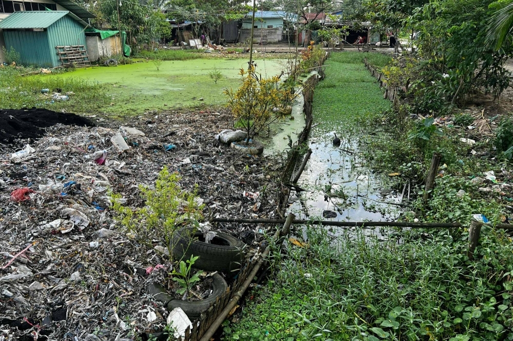 For years, sites across Shwepyithar township have been filling up with trash that chokes fields, blocks the drainage of rains and causes fire risks.