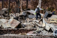 Combined search, rescue and recovery personnel conduct search operations of areas damaged by Maui wildfires in Lahaina, Hawaii | U.S. Army National Guard / via REUTERS 

