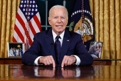 U.S. President Joe Biden addresses the nation on the conflict between Israel and Gaza and the Russian invasion of Ukraine from the Oval Office of the White House in Washington on Thursday.