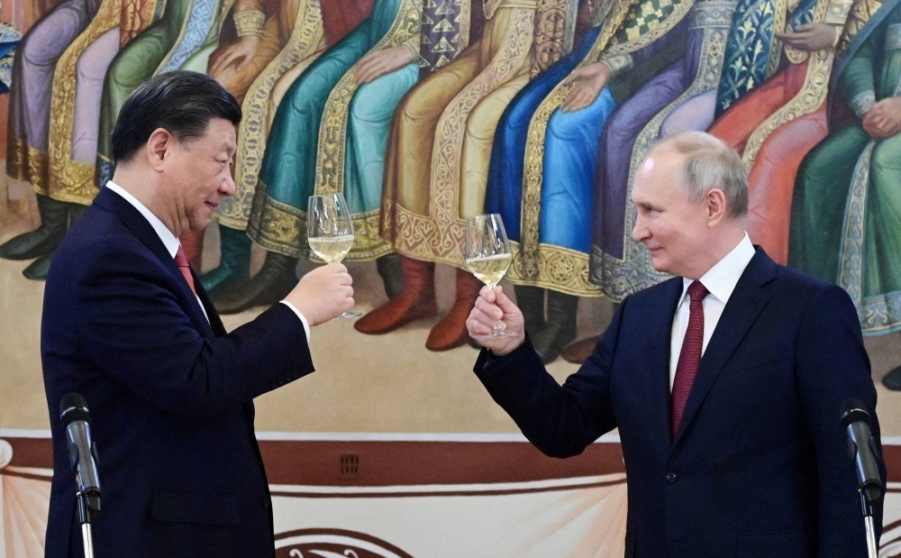 Chinese President Xi Jinping, and his Russian counterpart, Vladimir Putin, make a toast during a reception at the Kremlin in March.  