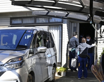 Police search the home of Tatsuya Yasuzumi in Kumagaya, Saitama Prefecture, on Sunday.