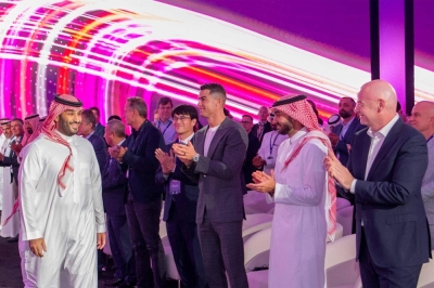 Soccer star Christiano Ronaldo (center) and FIFa President Gianni Infantino (right) welcome Saudi Crown Prince Mohammed bin Salman (left) during the announcement of the Esports World Cup in Riyadh on Monday.