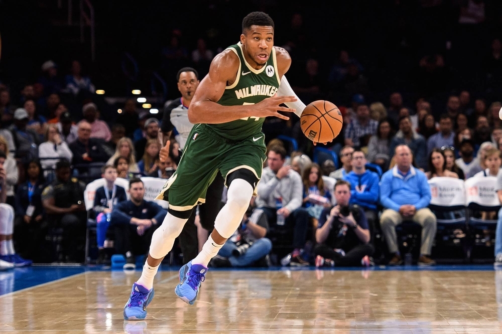 Bucks forward Giannis Antetokounmpo's new contract will give him the option to remain with the club through the 2027-28 season.