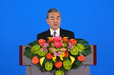 Chinese Foreign Minister Wang Yi speaks during an opening ceremony of a diplomatic symposium at the Diaoyutai State Guesthouse in Beijing on Tuesday.