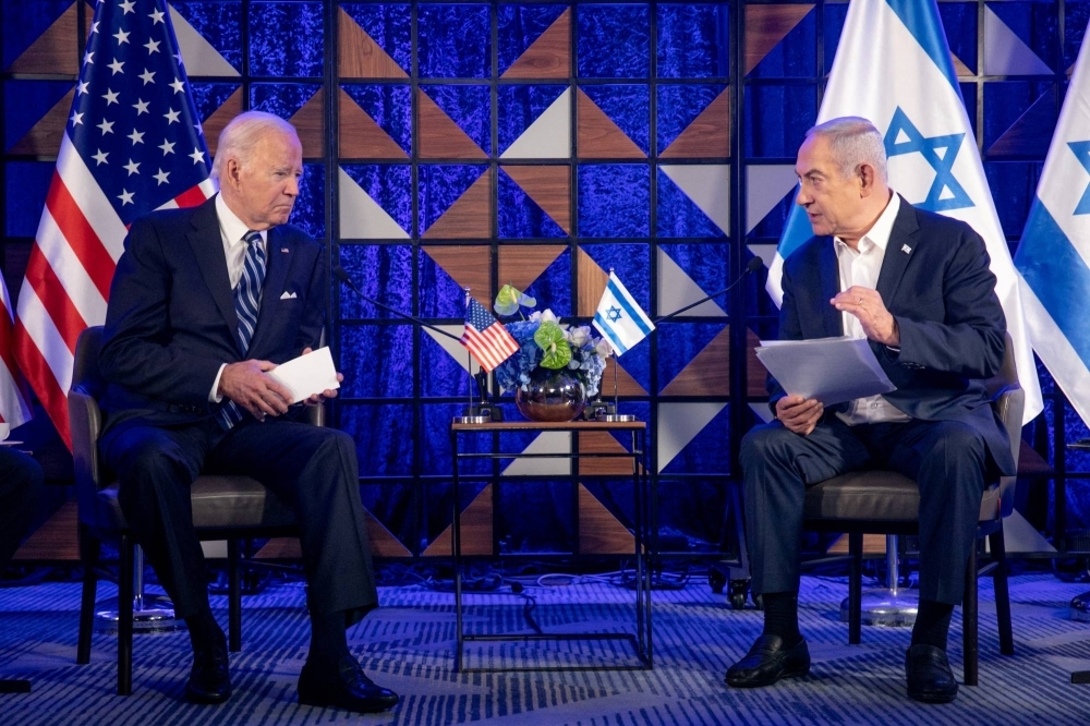 U.S. President Joe Biden meets with Israeli Prime Minister Benjamin Netanyahu to discuss the ongoing conflict between Israel and Hamas, in Tel Aviv, Israel, on Oct. 18.