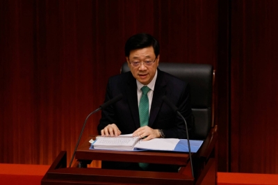 Hong Kong Chief Executive John Lee delivers his annual policy address at the Legislative Council in Hong Kong on Wednesday