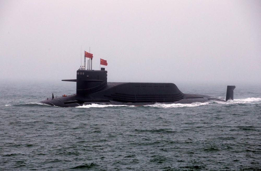 Chinese Navy's nuclear-powered submarine Long March 11 takes part in a naval parade off the eastern port city of Qingdao, China, in 2019.