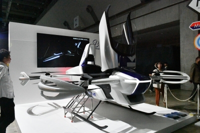 SkyDrive displays its eVTOL flying car at the Japan Mobility Show in Tokyo.