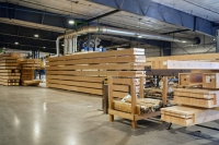 After the boards are pressed, the adhesive has cured and the glulam beams are precision-cut, they’re ready to be shipped to a construction site.  | Bloomberg