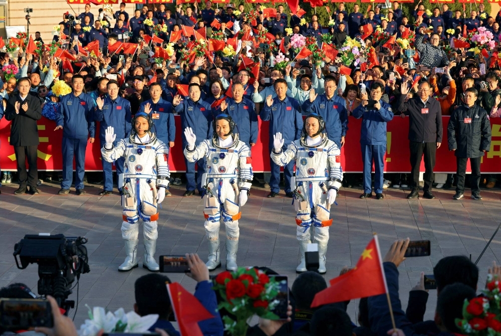 Chinese astronauts attend a see-off ceremony at Jiuquan Satellite Launch Center near Jiuquan, Gansu province, China, on Thursday