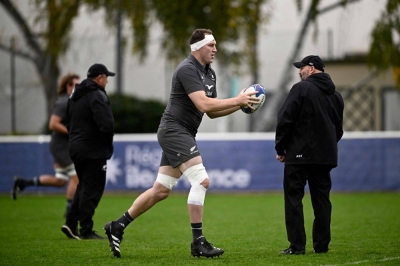 New Zealand lock Brodie Retallick runs with the ball during a training session at the Stade du Parc in Rueil-Malmaison, near Paris, on Thursday, ahead of Saturday's Rugby World Cup final against South Africa.