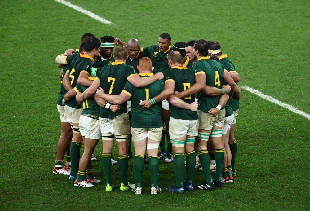 South Africa players huddle ahead of the second half of the team's semifinal game against England in the Rugby World Cup, in Saint-Denis, France, on Saturday.