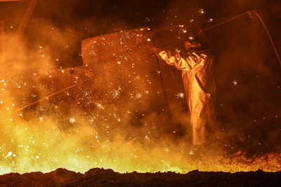 An employee operates at a production facility of Zaporizhstal Iron and Steel Works, in Zaporizhzhia, Ukraine, this month.
