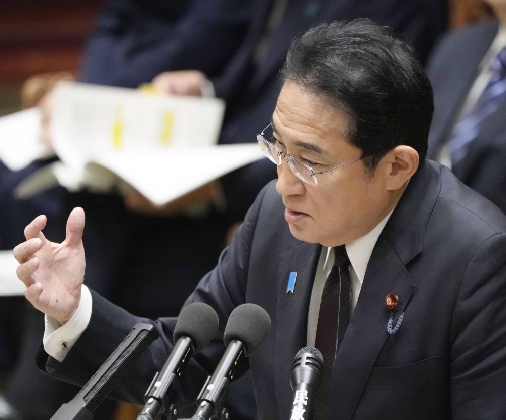 Prime Minister Fumio Kishida replies to questions at Friday's budget committee session at the Diet in Tokyo.