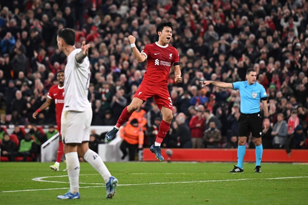 Liverpool's Wataru Endo celebrates scoring against Toulouse in a Europa League game in Liverpool, England, on Thursday.