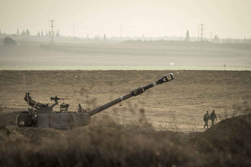 Israeli army artillery personnel near Sderot, Israel, on Saturday