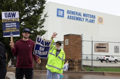 United Auto Workers members strike at a General Motors assembly plant in Arlington, Texas, on Oct. 24. 