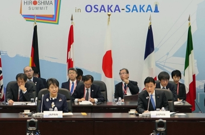 Trade minister Yasutoshi Nishimura (front right) speaks during a meeting of Group of Seven trade ministers in the city of Osaka on Saturday.
