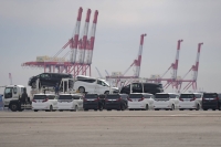 Toyota's Alphard and Vellfire minivans bound for shipment at Yokohama port. Toyota posted record global production and sales in the April-September period. | Bloomberg