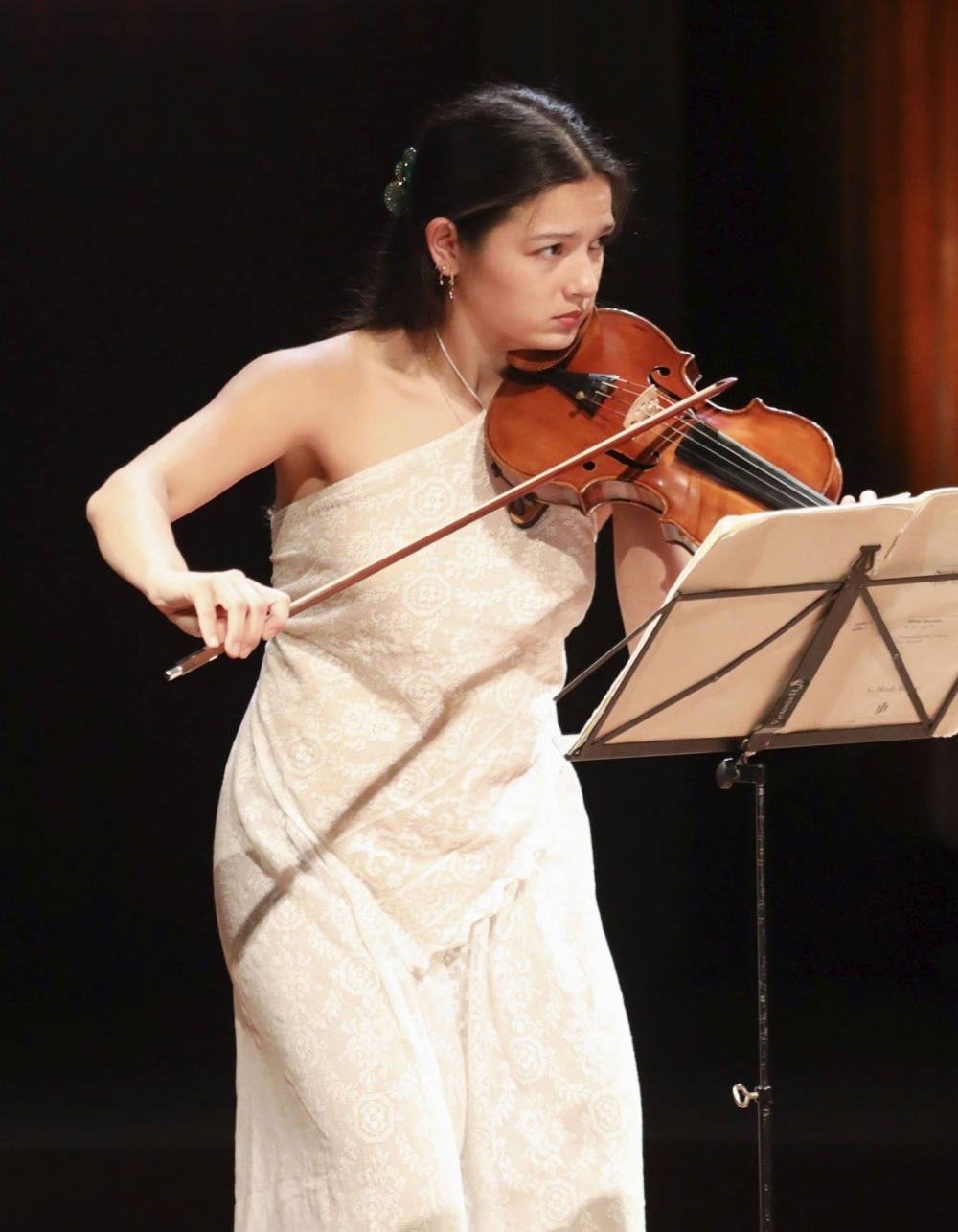 Violinist Kaya Kato Moller, a member of Novo Quartet, performs during the string quartet final at the Geneva International Music Competition on Sunday.