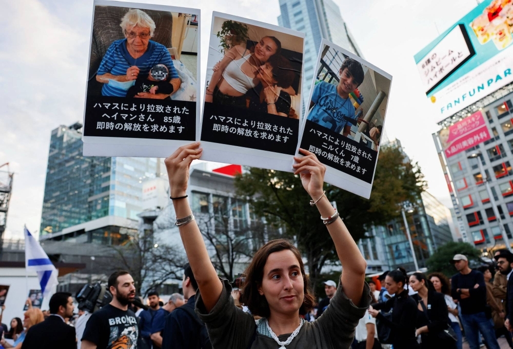 A rally in support of Israel is held in Tokyo on Oct. 11 during which participants, including Israelis living in Japan, demanded the immediate release of all hostages captured by Hamas during its Oct. 7 attack on Israel.