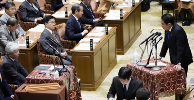 Prime Minister Fumio Kishida answers questions at a Lower House Budget Committee session on Monday.