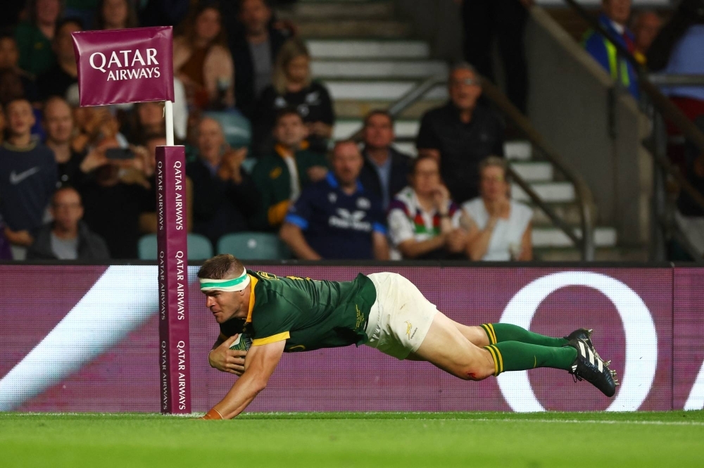 South Africa's Malcolm Marx scores a try during a Rugby World Cup warmup game against New Zealand in London on Aug. 25.