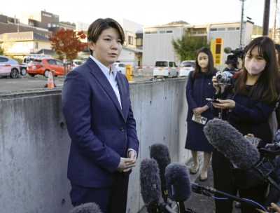 Rina Gonoi, who made the rare move of coming forward over alleged sexual offenses she suffered while serving as a Ground Self-Defense Forces member, speaks to reporters outside the Fukushima District Court on Monday.