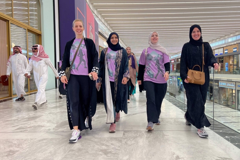 Saudi women exercise in a mall in Riyadh on Oct. 15. Long popular in the United States, another car-centric country with an obesity problem, mall-walking is increasingly becoming a Saudi sport. 