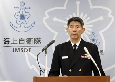 Maritime Self-Defense Force Chief of Staff Ryo Sakai speaks during a news conference Tuesday at the Defense Ministry in Tokyo.