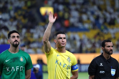 Becoming the lone bidder for the 2034 World Cup, just 27 days after its campaign was announced, caps a stunning year where the unheralded Saudi Pro League has snapped up some of soccer's top stars including Cristiano Ronaldo (center). 