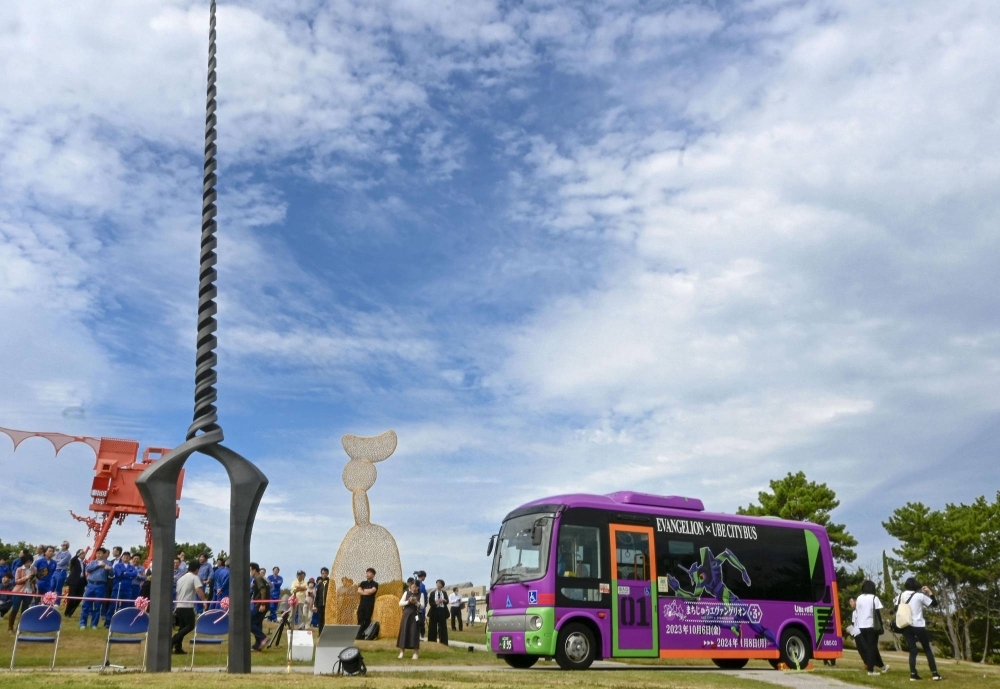 A spear, modeled on the "Spear of Longinus" that features in the hit anime series "Neon Genesis Evangelion," protrudes from the ground in Ube, Yamaguchi Prefecture, in October.