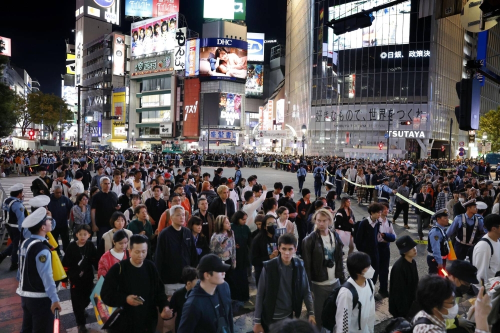 A crowded crossing near Shibuya Station in Tokyo on Tuesday