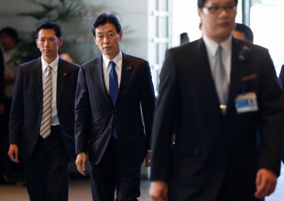 Economy minister Yasutoshi Nishimura (center) is right to insist that economic security is linked to national power and determines the fate of the nation. REUTERS