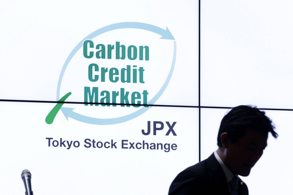 A ceremony marking the opening of the carbon credit market at the Tokyo Stock Exchange in Tokyo on Oct. 11