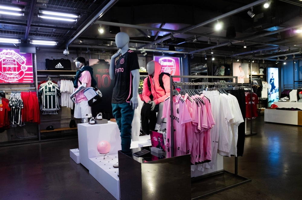 Lionel Messi jerseys, in Inter Miami’s distinctive pink color, for sale at the Adidas store in Manhattan in September. In the span of three months, the soccer superstar has made Inter Miami’s eye-catching pink jersey the hottest piece of sports merchandise on the planet.