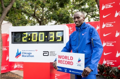 Kelvin Kiptum of Kenya celebrates after finishing in a world record time of 2:00:35 to win the Chicago Marathon on Oct. 8.