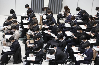 University students attend a job fair in Tokyo on March 1.