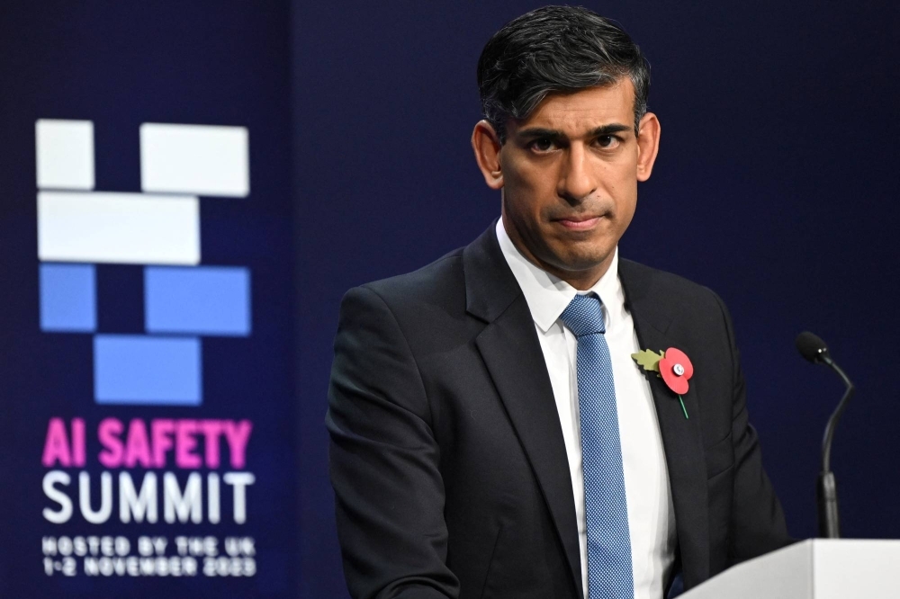 British Prime Minister Rishi Sunak listens to a question as he holds the closing news conference on the second day of the U.K. Artificial Intelligence Safety Summit at Bletchley Park, near Milton Keynes, England, on Thursday.