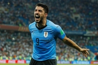 Uruguay forward Luis Suarez celebrates a win after a World Cup match in 2018 in Sochi, Russia.  | AFP-JIJI
