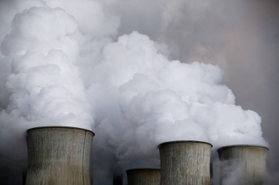 Steam rises from the cooling towers of the coal power plant of RWE, one of Europe's biggest electricity and gas companies, in Niederaussem, Germany.