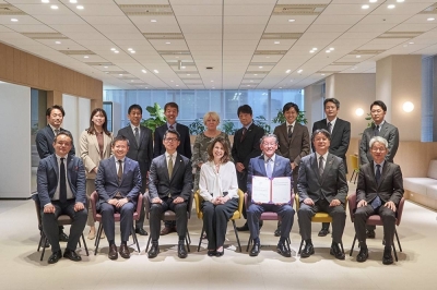 Group photo after an NTT smart city was certified Level 4