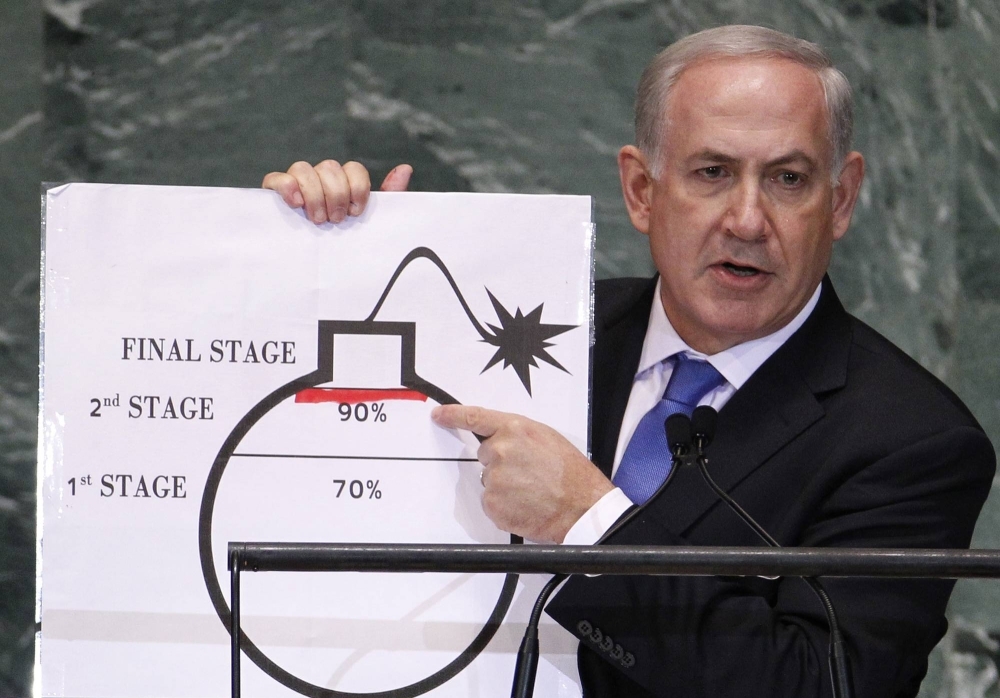 Israeli Prime Minister Benjamin Netanyahu points to a red line he drew on the graphic of a bomb used to represent Iran's nuclear program as he addresses the United Nations General Assembly at the U.N. headquarters in New York in September 2012.