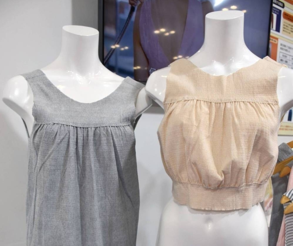 Single-use bathing wear that comes in the form of a blouse or a dress