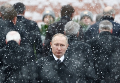 Russian President Vladimir Putin attends a wreath-laying ceremony to mark Defender of the Fatherland Day at the Tomb of the Unknown Soldier by the Kremlin wall in central Moscow in February 2017.