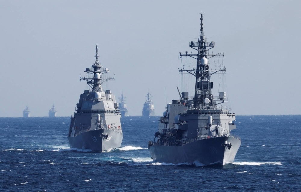 The Maritime Self-Defense Force's Takanami destroyers leads the MSDF fleet during the International Fleet Review to commemorate the 70th anniversary of the foundation of the force in Sagami Bay, off Yokosuka, Kanagawa Prefecture, in November last year.