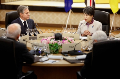 U.S. Secretary of State Antony Blinken (left) and Foreign Minister Yoko Kamikawa attend a working dinner during G7 ministerial meetings, in Tokyo on Tuesday.