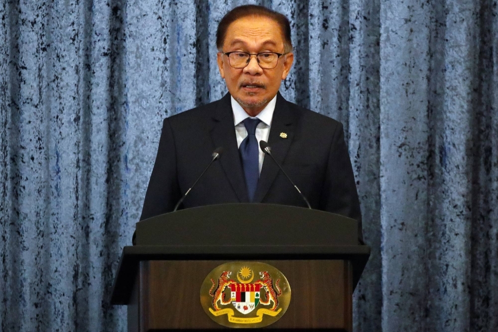 Malaysia Prime Minister Anwar Ibrahim speaks at a press conference during Japanese Prime Minister Fumio Kishida's official visit, at Putrajaya, Malaysia, on Sunday. 