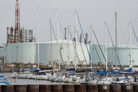 Oil storage tanks at Eneos' Negishi refinery in the Keihin industrial area of Yokohama. The firm said Wednesday that its full-year profit result was expected to increase by 67% from last year. | Bloomberg
