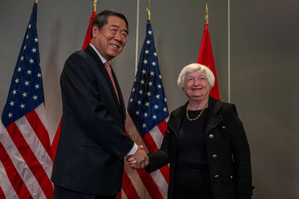 U.S. Treasury secretary Janet Yellen (right) and He Lifeng, China's vice premier, shake hands during a meeting in San Francisco, California, on Thursday.